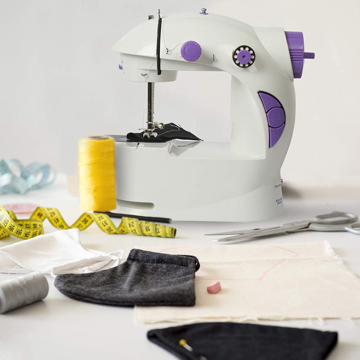 Akiara Portable Mini Sewing Machine with Handy Sewing Kit & Accessories – Electric Stitching Machine with Foot Pedal, Dual Speed & AC/DC Power (White & Purple)